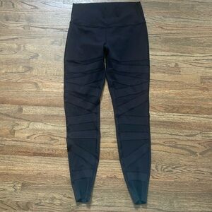 Size 10 black lululemon leggings with mesh front legs